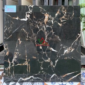 Gạch 60x60 marble đen vân cam sang trọng