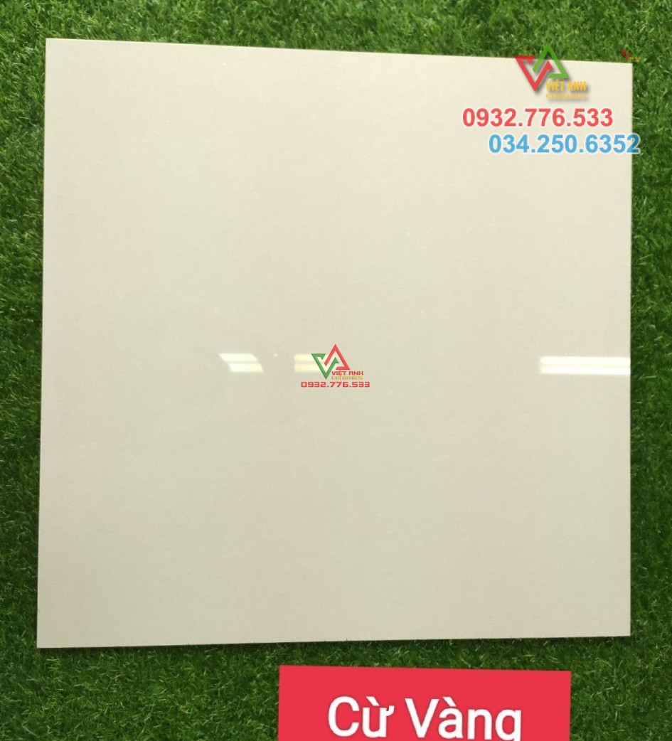 Gạch 100x100 đá bóng kiếng hàng nhập khẩu vân cừ vàng