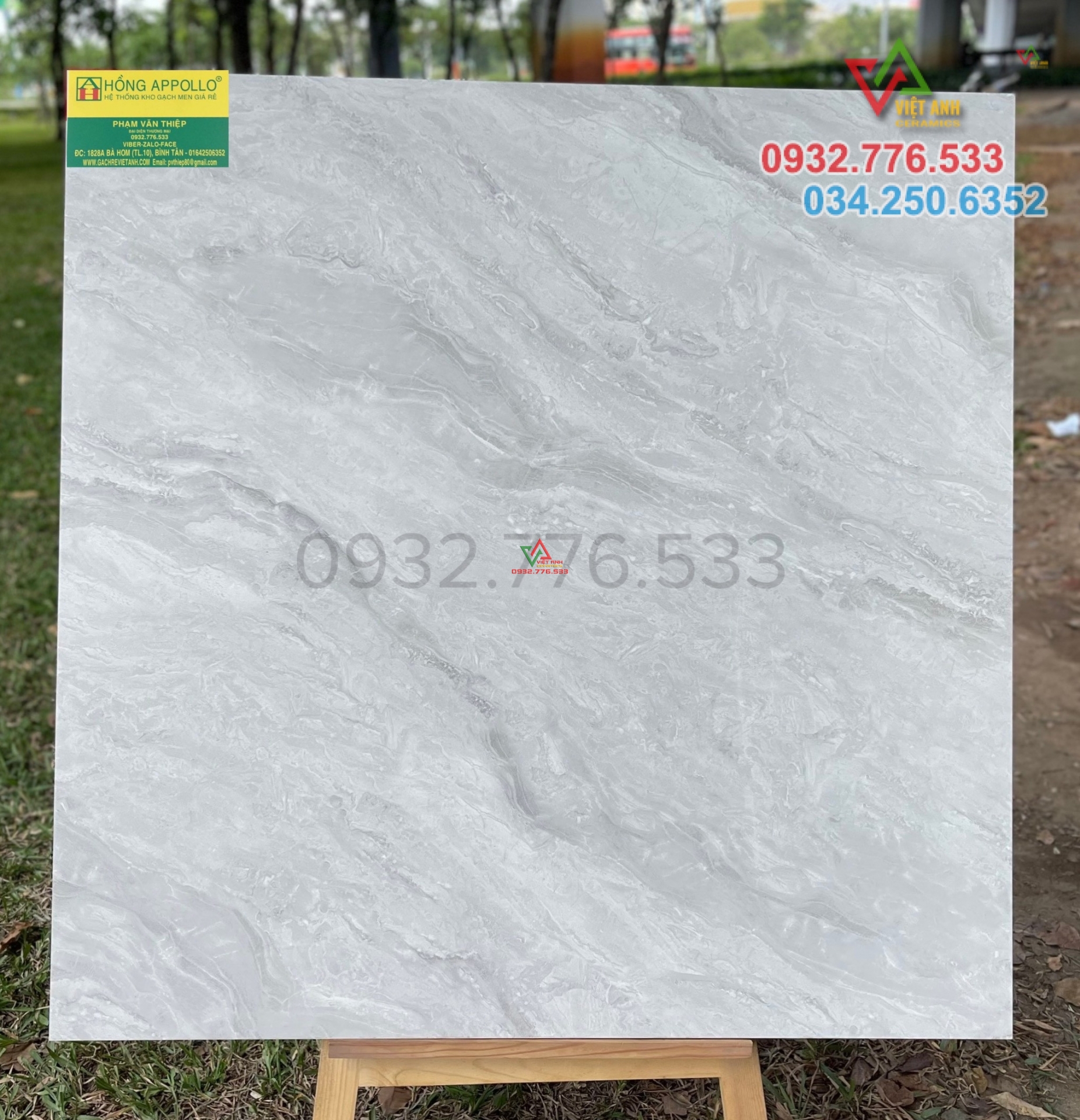 Gạch 100x100 màu xám vân đá bóng kiếng hàng nội địa VN