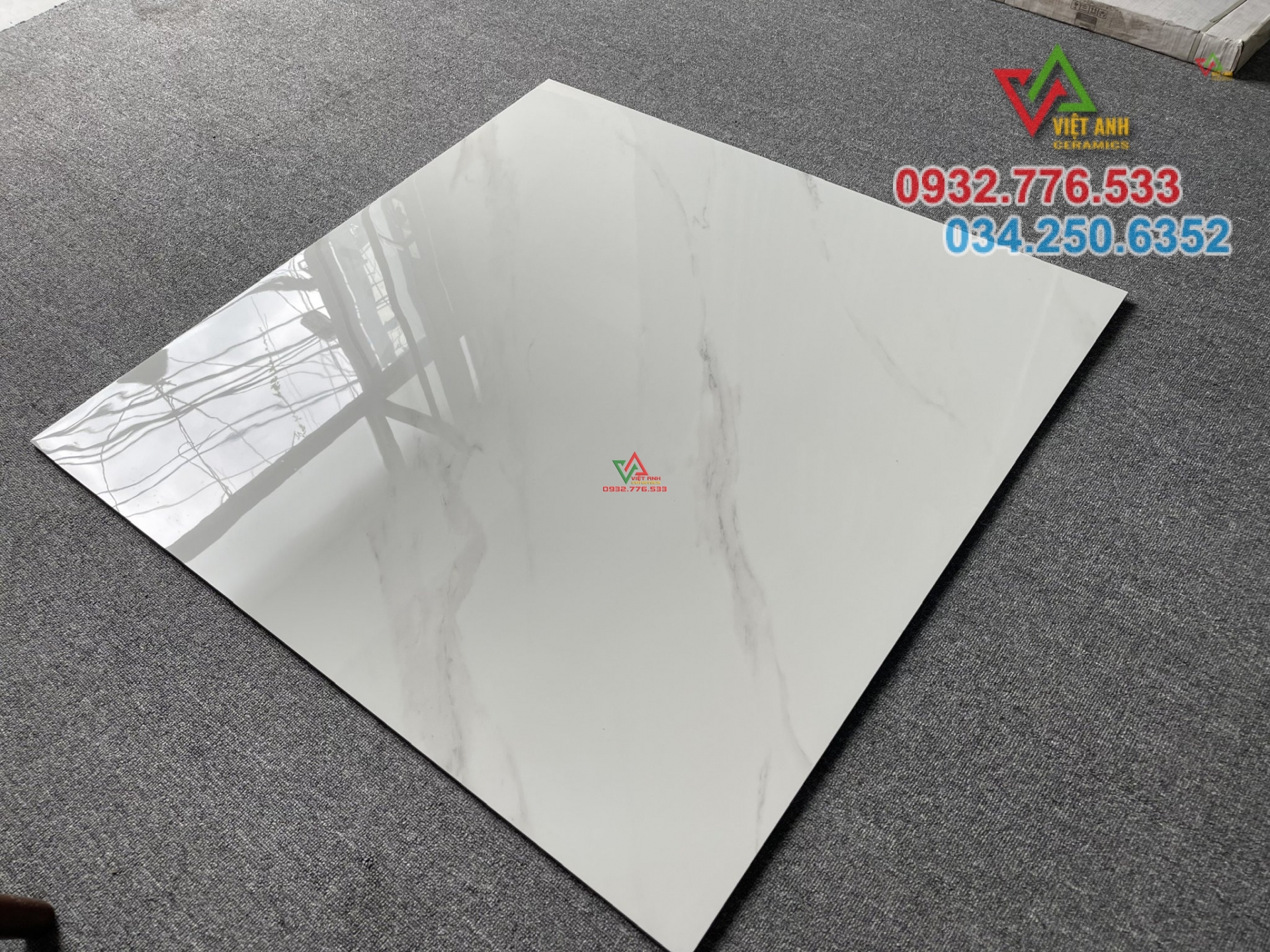 Gạch khổ lớn 100x100 đá bóng kiếng màu trắng vân khói sang trọng
